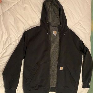 Men’s Large Carhartt rain defender jacket.